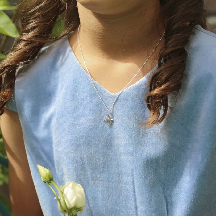 girl wearing mini Monroe silver necklace for children