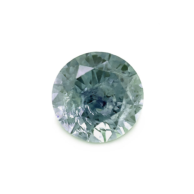 round loose blue green grey shattered glass inclusion Montana sapphire front