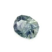 Fancy-cut oval geometric grey blue green loose Montana sapphire side
