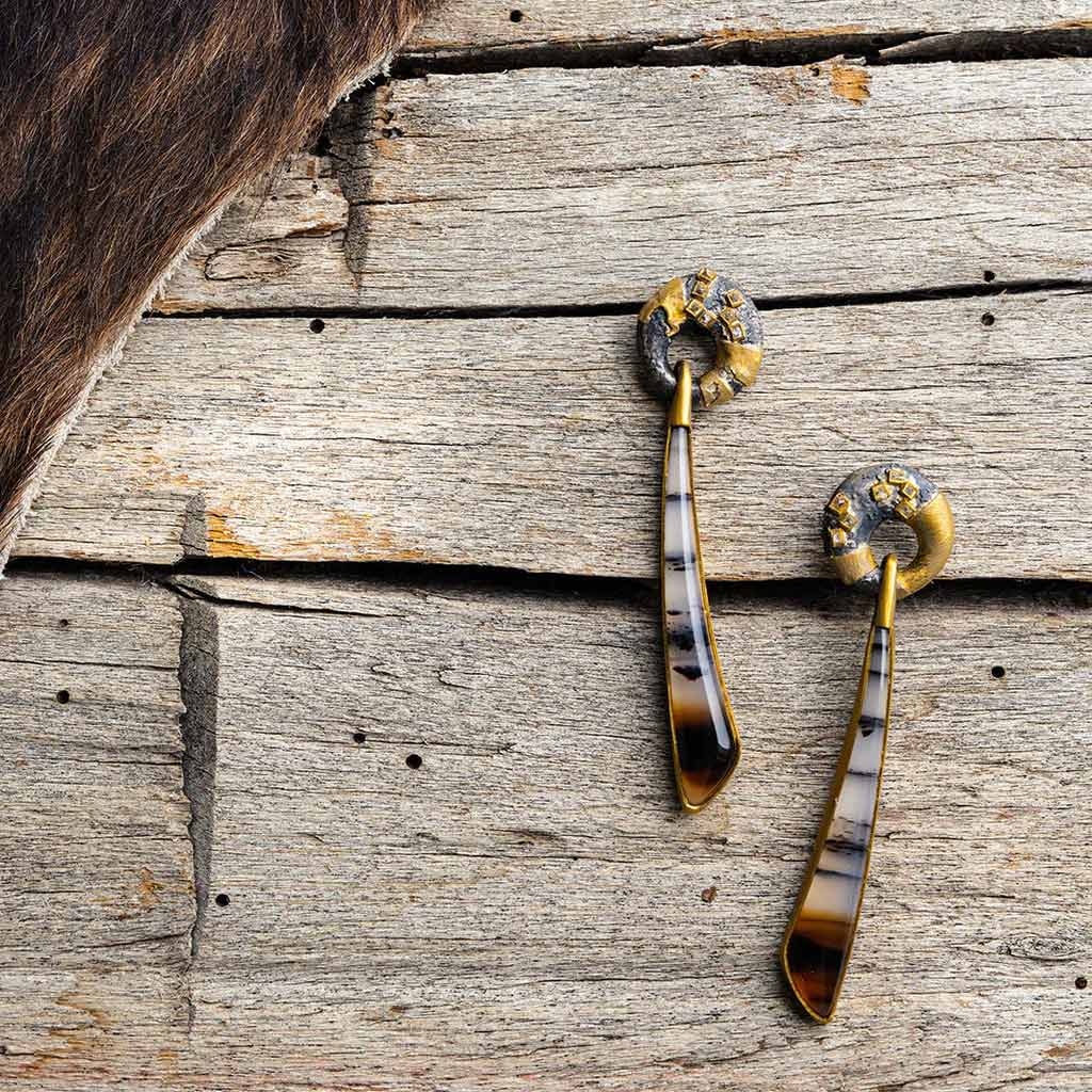 Necklace with blue gemstone and gold beads