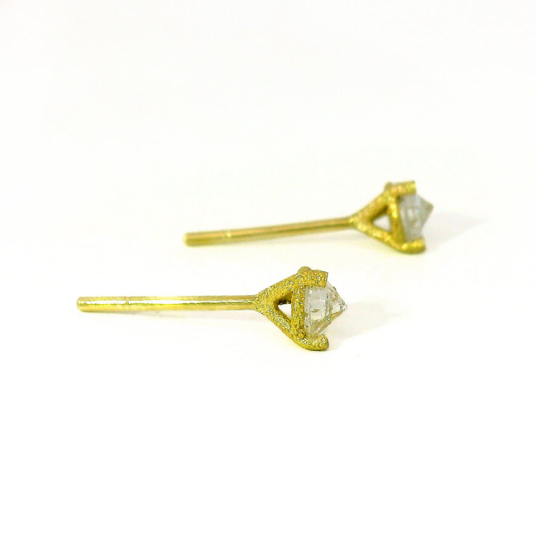 Close-up of pointed diamond profile on Turned Light stud earring