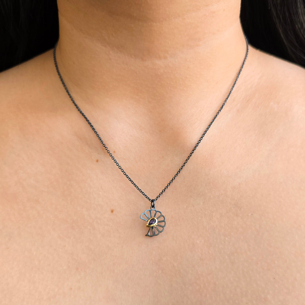 Petite Hyacinth pendant with pear-shaped sapphire and openwork silver petals