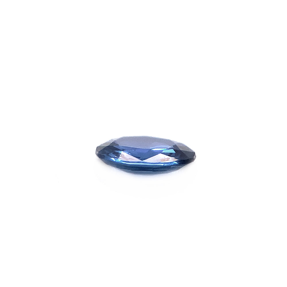 Side view of blue oval-cut Yogo sapphire