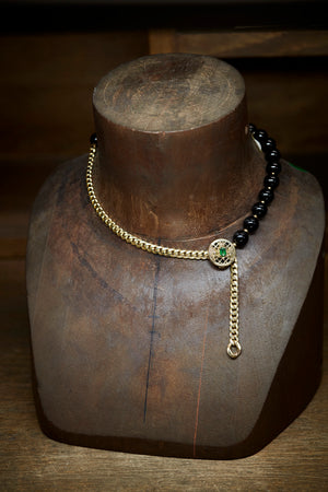 Dual chain necklace. Half gold chain and half black beads.