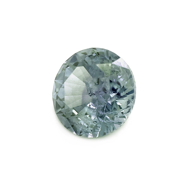 round loose blue green grey shattered glass inclusion Montana sapphire side
