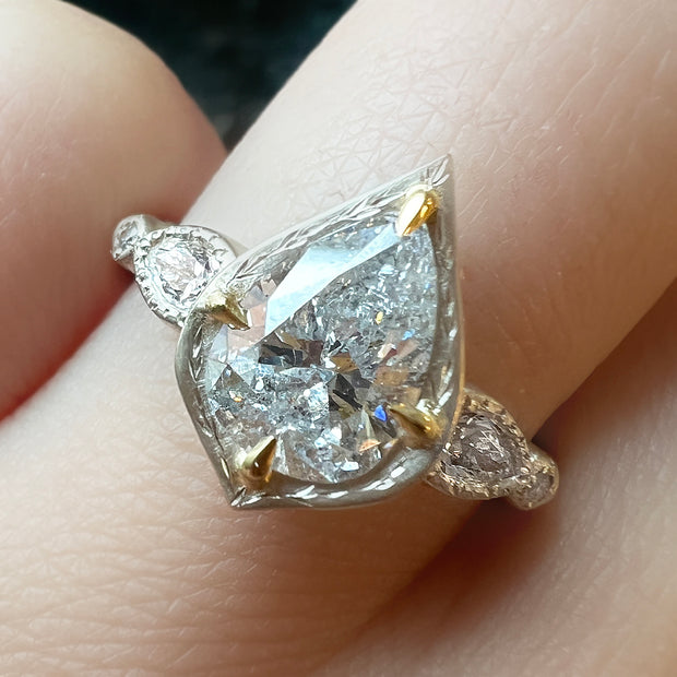 adel chefridi 18K white gold pear diamond engagement ring model close up