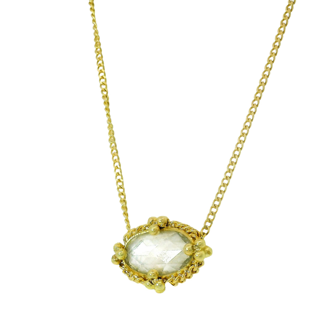 Close-up of natural rose-cut diamond showing soft antique-inspired glow