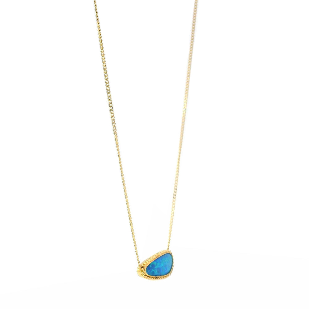 Freeform opal doublet pendant with textured gold border
