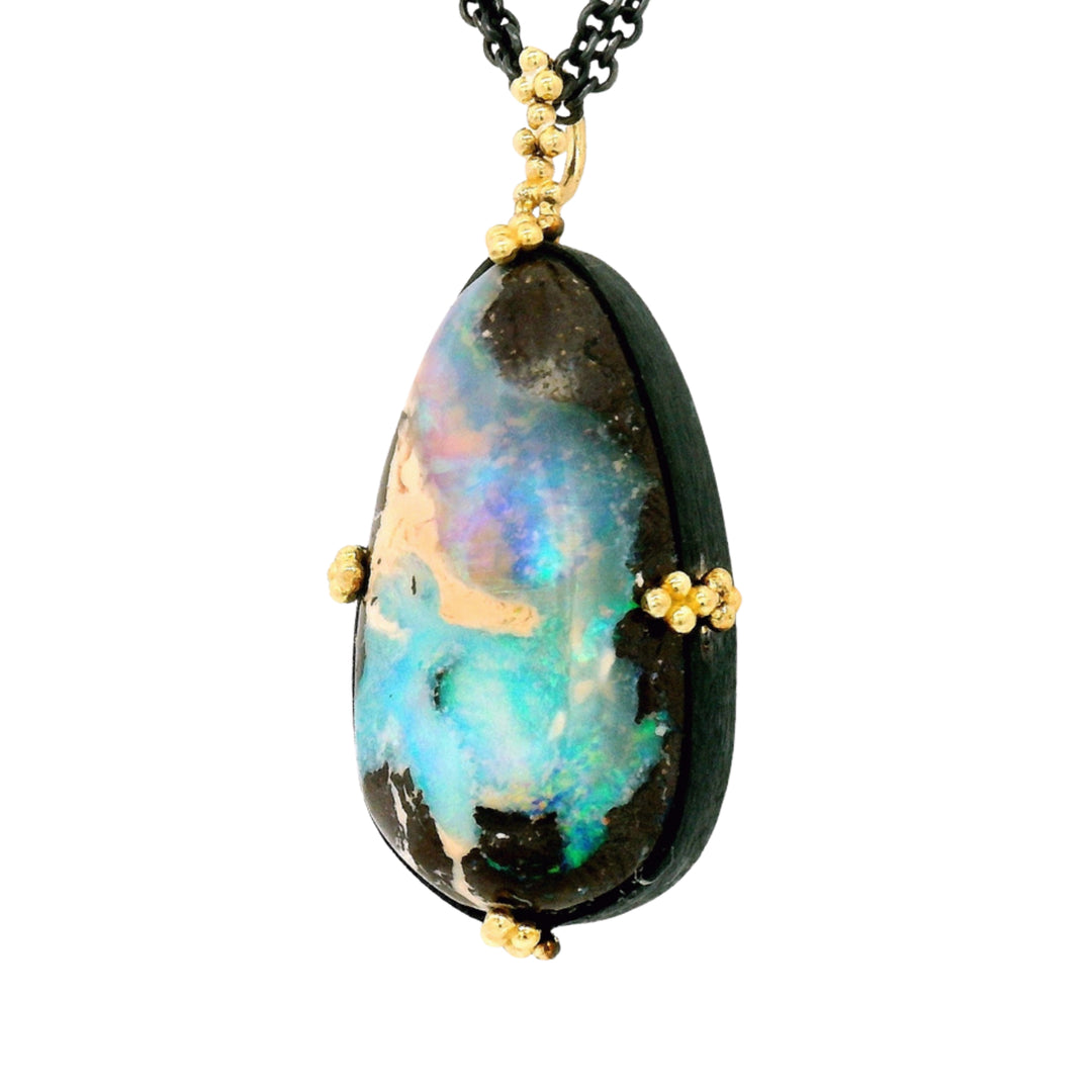 Australian boulder opal pendant in oxidized silver with 18K gold and diamonds