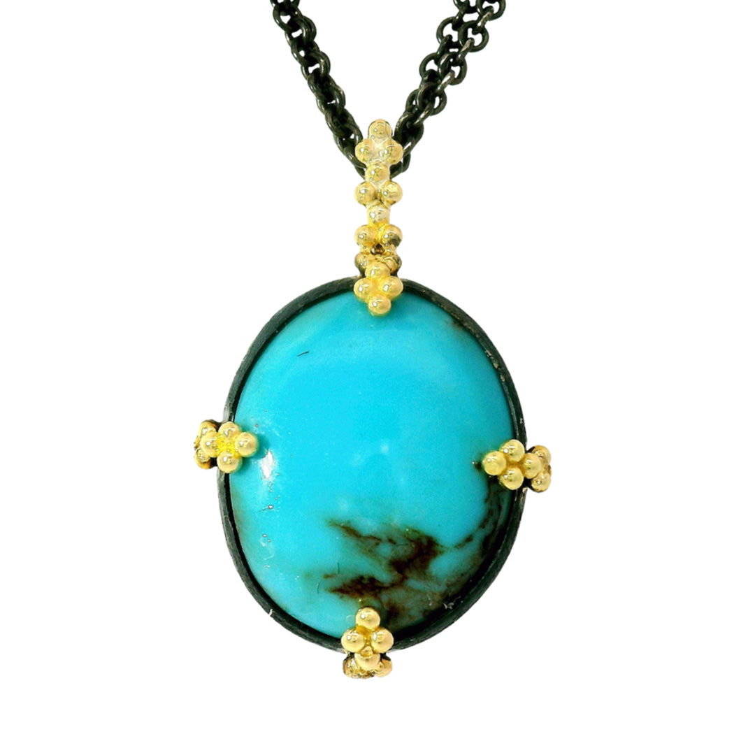 Close-up of Blue Moon turquoise cabochon showing natural matrix pattern