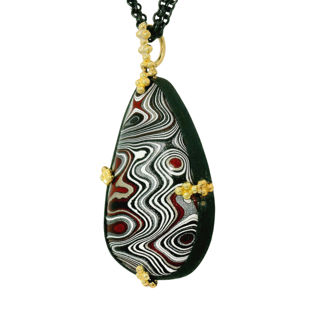Freeform Fordite pendant with grey diamond rondelles on adjustable chain