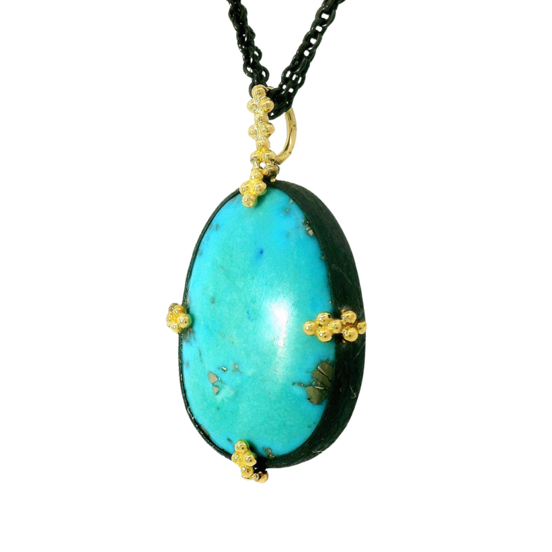 Turquoise statement necklace in oxidized silver with 18K gold prongs