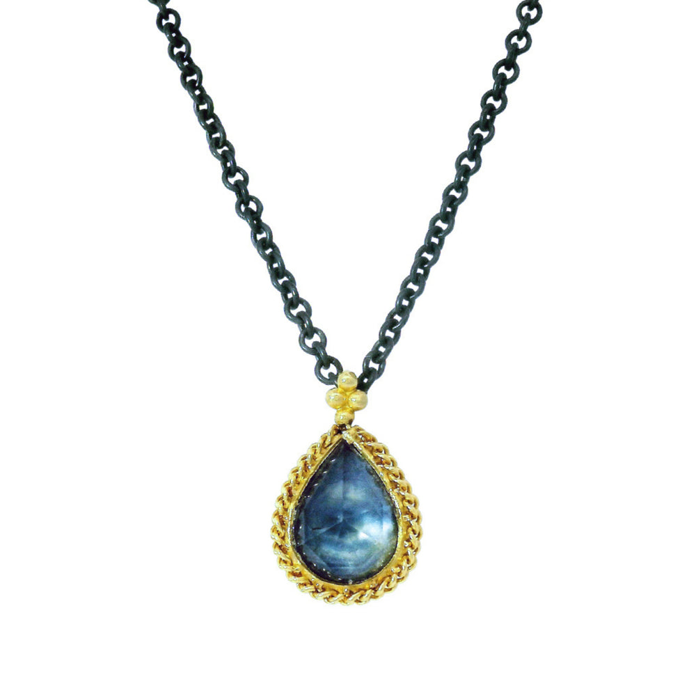 Pear-shaped rose cut Montana sapphire pendant with gold beaded bezel