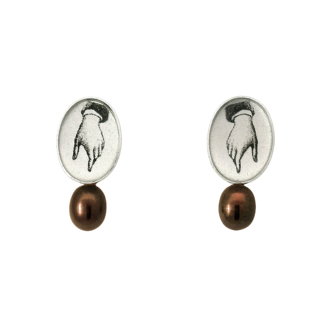 Illustrated hand motif studs with peacock freshwater pearl drop