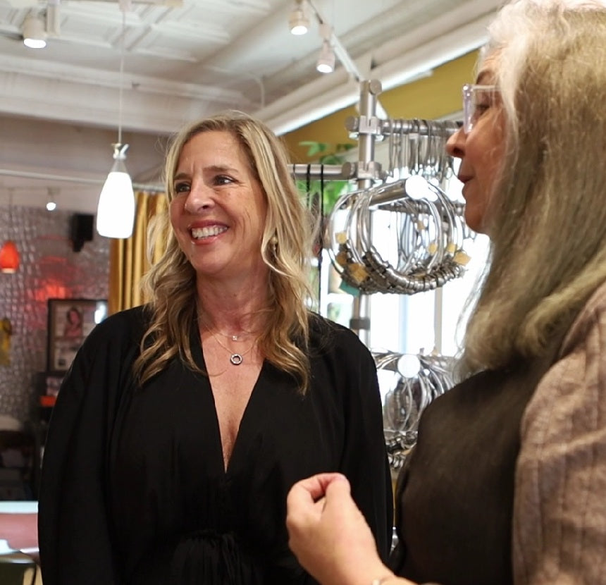 Babs Noelle of Alara Jewelry presenting ethical fine jewelry to customer