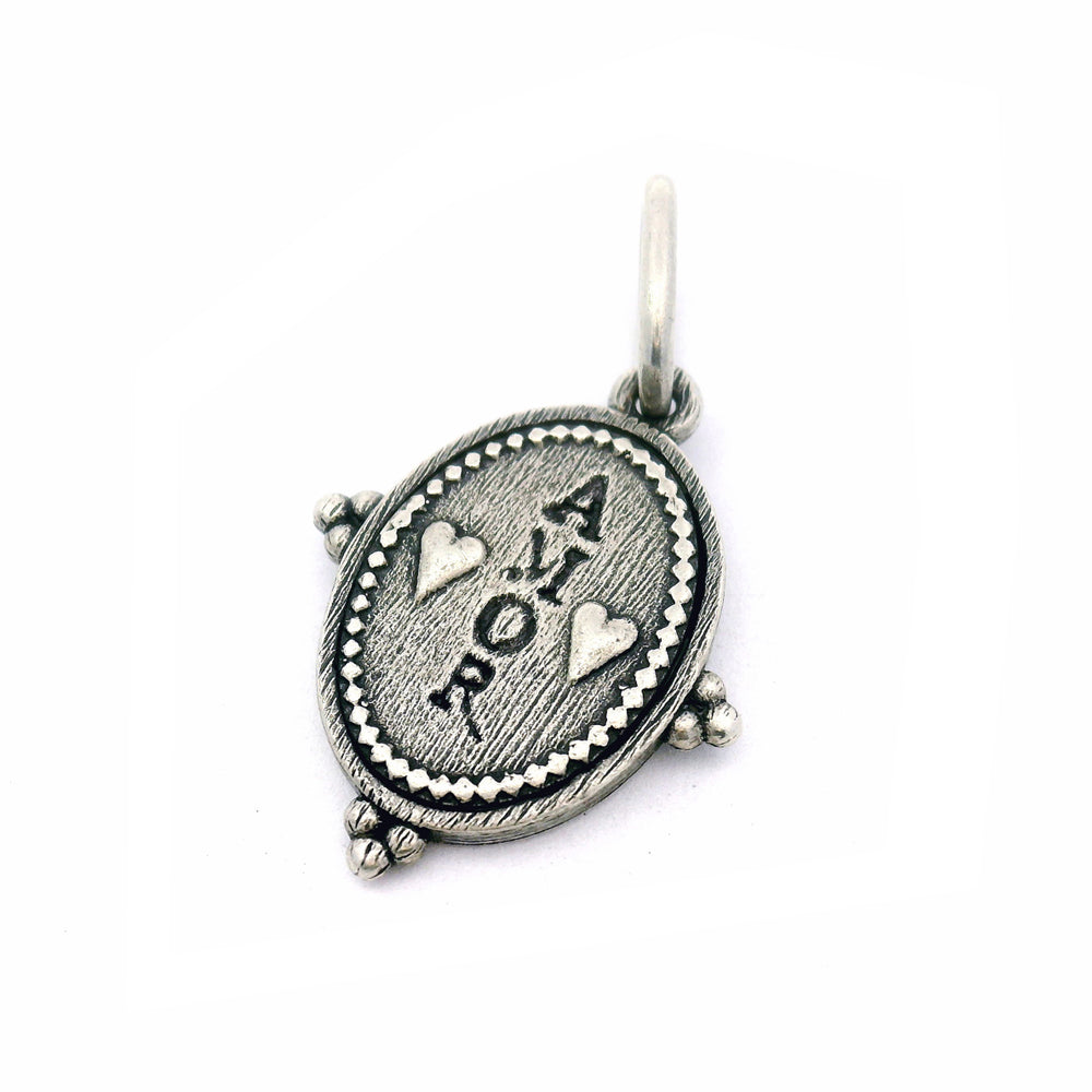 Silver Pendant with Amor and Hearts against white background