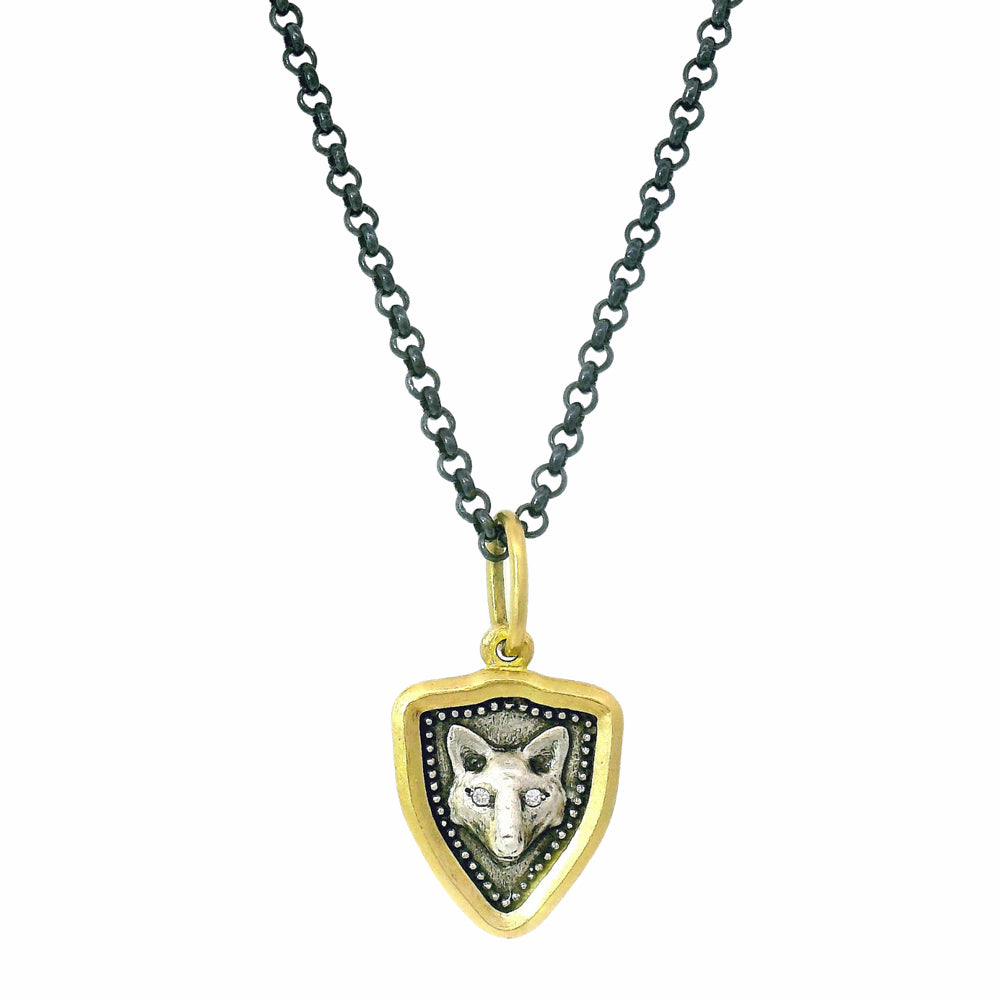 Shield-shaped fox pendant with diamond accents and milgrain detail