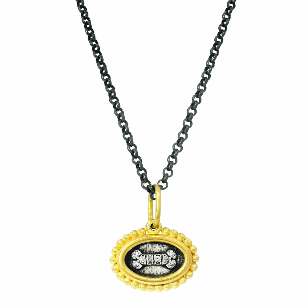reversible dog bone and AMORE charm pendant from Alara Jewelry