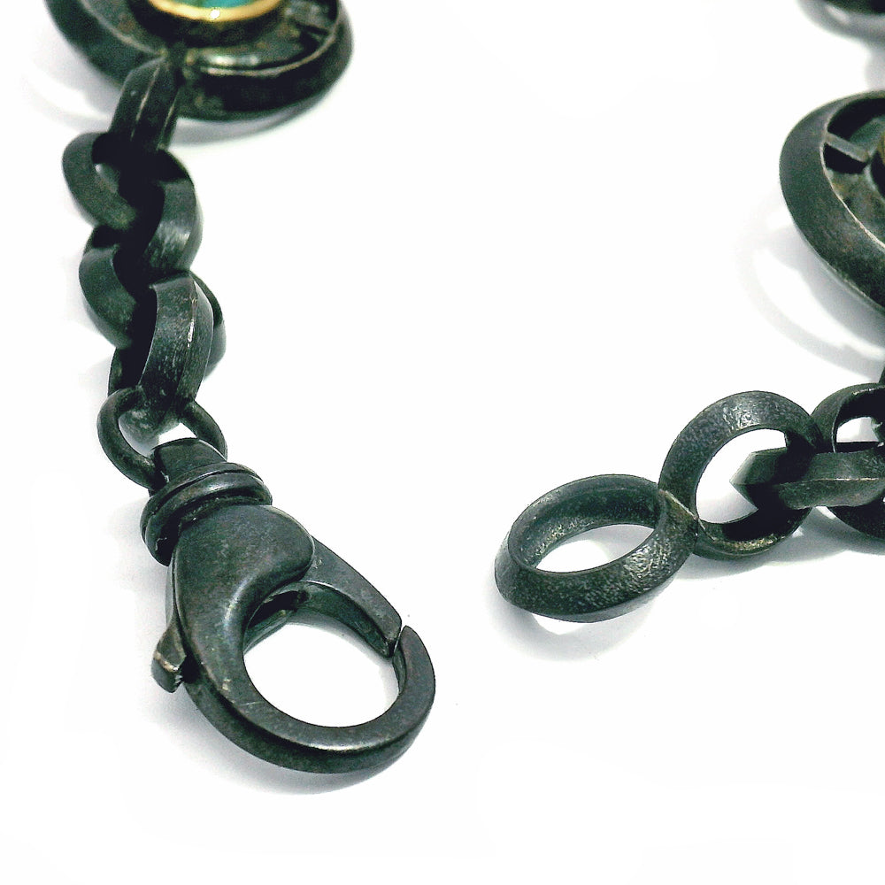 Handmade link bracelet with three turquoise cabochon stations