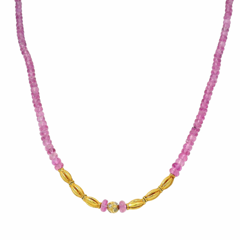 Pink sapphire strand necklace with diamond-accented center bead