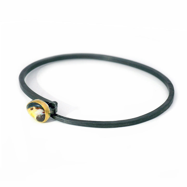 One-of-a-kind Australian opal bracelet with brushed silver cuff and gold bezel