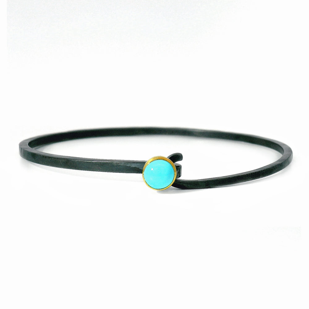 Sleeping Beauty turquoise hook bracelet by Karin Jacobson in gold and silver