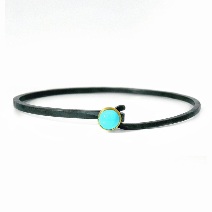 Sleeping Beauty turquoise hook bracelet by Karin Jacobson in gold and silver