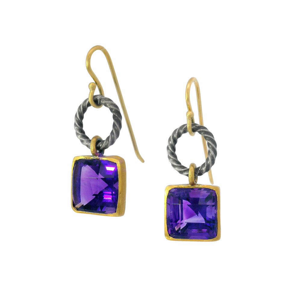 Twisted silver circle earrings with amethyst and 22K gold bezel setting