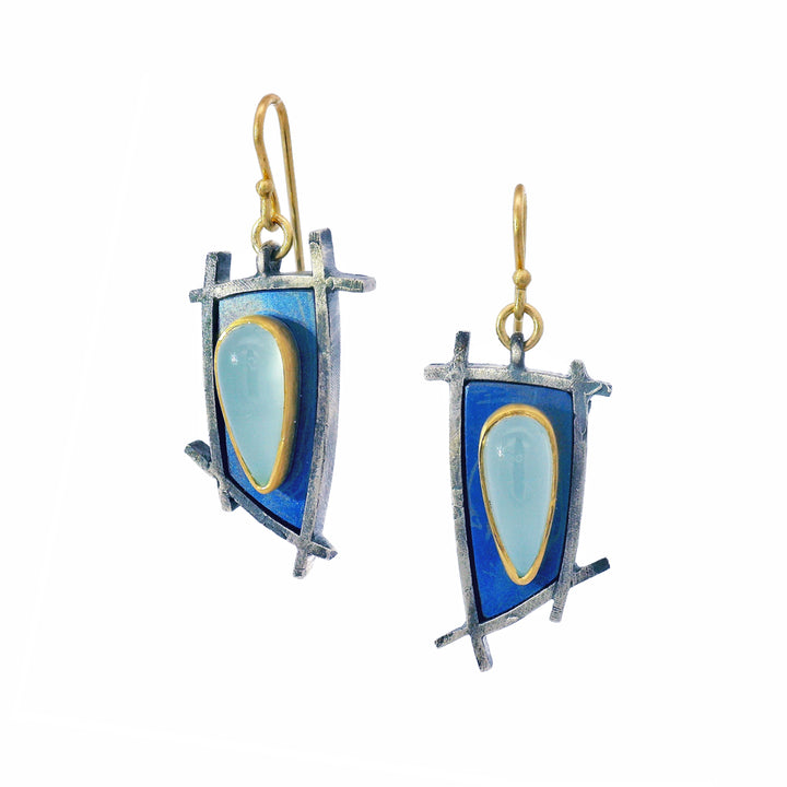 Asymmetric aquamarine drop earrings with anodized titanium and 22K gold by Michael Jensen