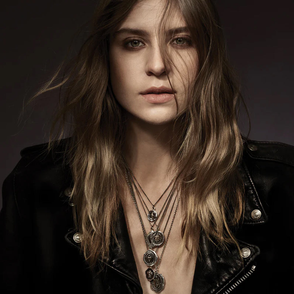 Woman wearing Watch Over Me owl talisman necklace by Pyrrha from Alara Jewelry