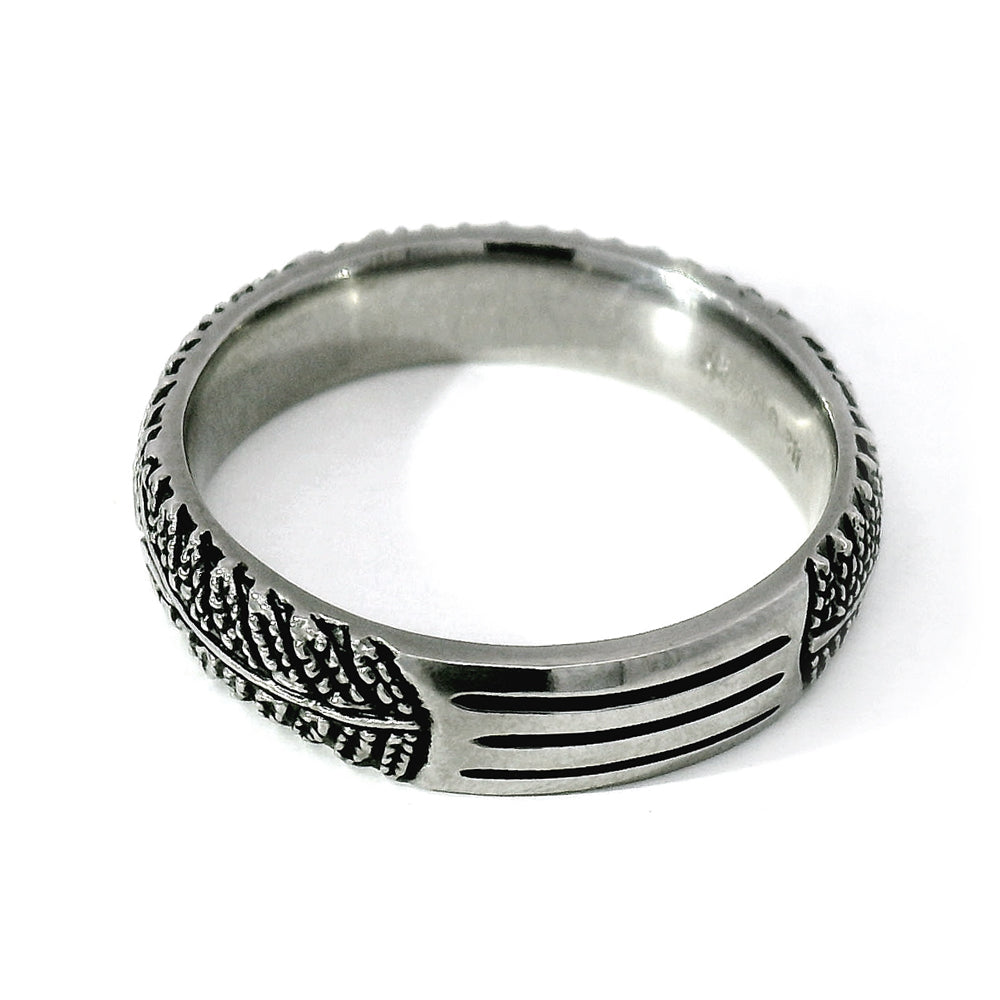 Fern motif wedding ring in stainless steel with darkened detail