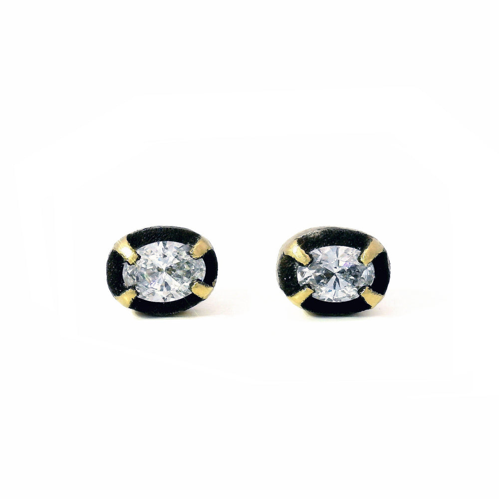 Blackened Gold Oval Diamond Studs – “Night Aperture”