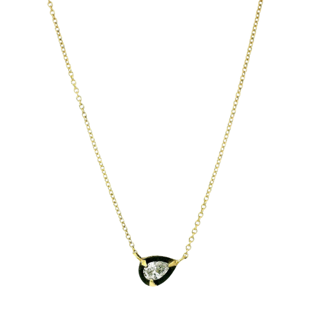 Umbra pear-shaped diamond necklace by René Escobar in 18K gold