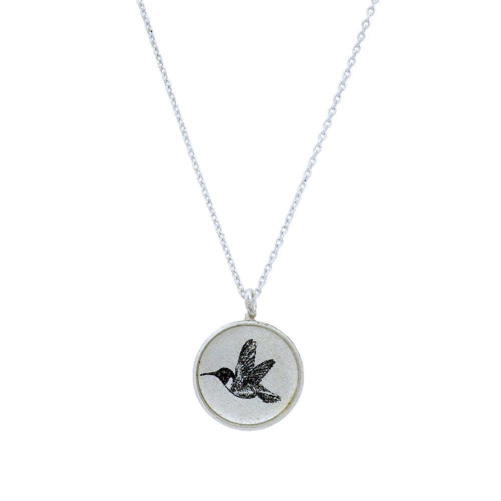 Etched hummingbird medallion with oxidized cable-link chain