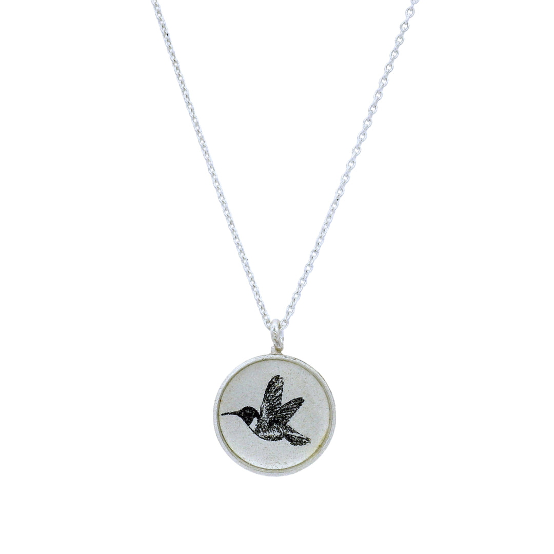 Etched hummingbird medallion with oxidized cable-link chain