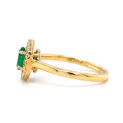 Oval Emerald, Diamond Halo, and 14K Yellow Gold Ring Side