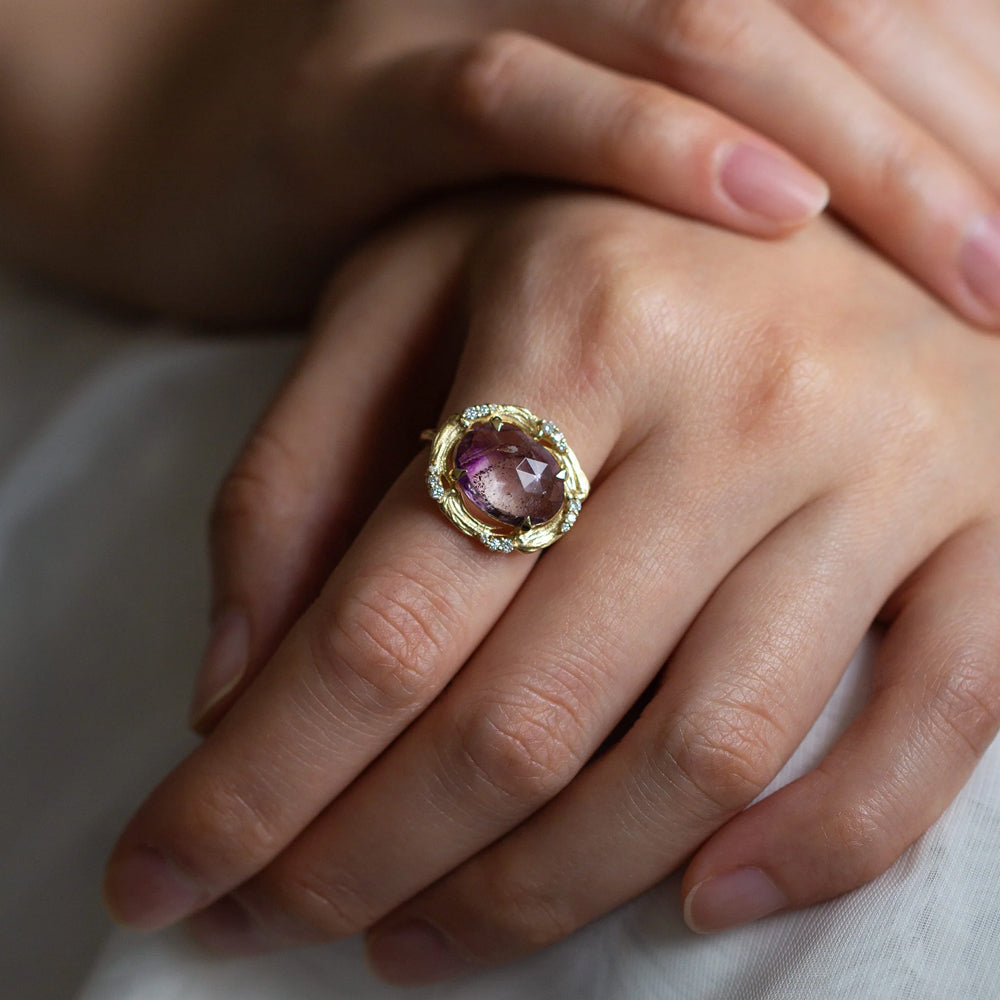 Real pretty violet stone with diamonds sold 14kt gold ladies ring