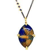 lapis lazuli and rutilated quartz doublet  pendant on an oxidized sterling silver chain with small lapis accents and yellow gold