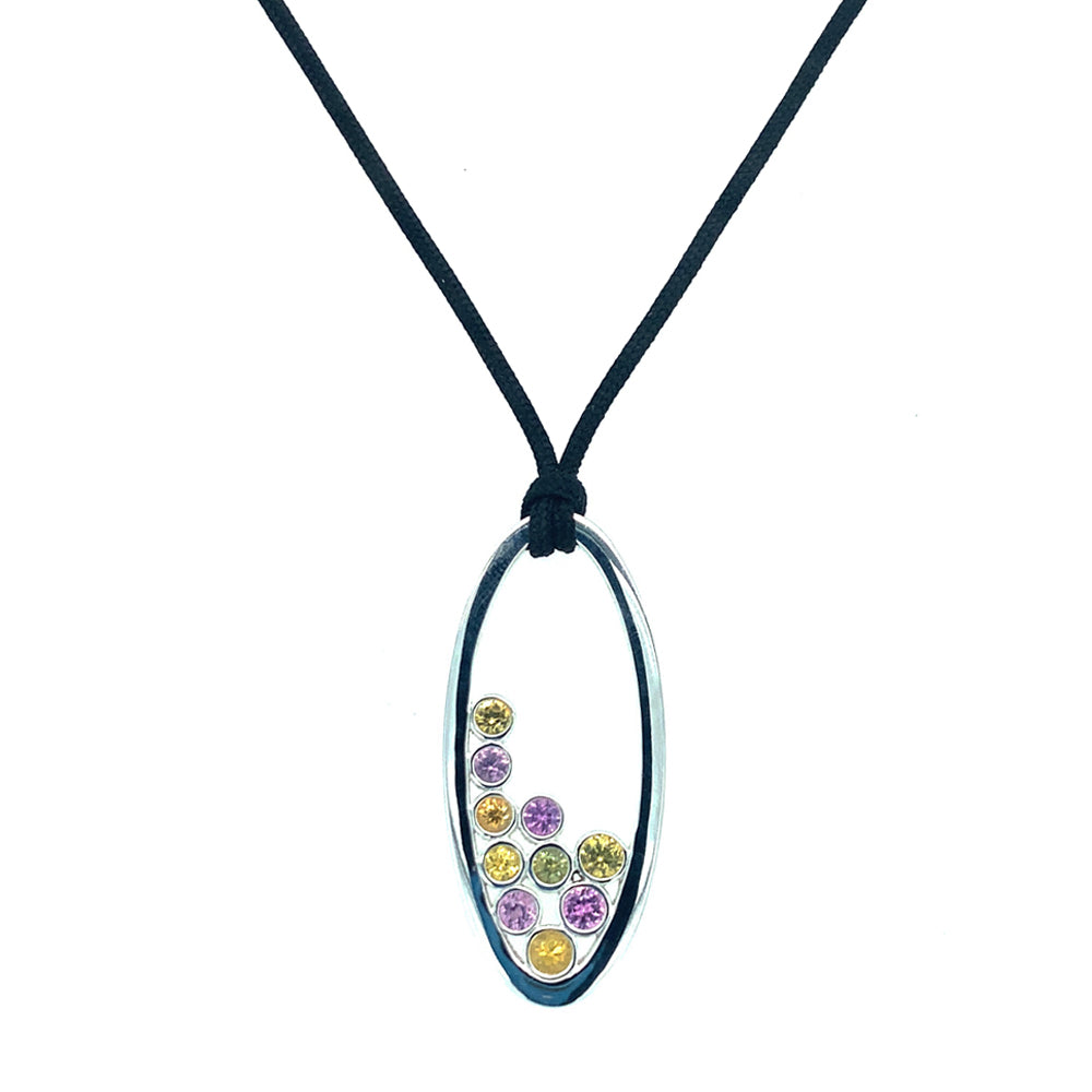 Sterling silver pendant, Montana sapphires in a variety of pink and yellow hues, total gems (quantity 10 ) weight is 1.00ctw. Pendant length, oval 1-1/2" x 11/16".  length: 30" maximum silk lanyard, adjustable down to any length.