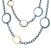•	Toby Pombroy, blackened Sterling silver (.925 EcoSilver ) and  matte 14 karat yellow (EcoGold). Length: 35" cable chain (adjustable), eclipse dimensions: EcoGold 1/2" x 5/8"", EcoSilver 5/8" x 3/4".