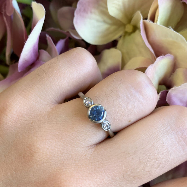 This light blue sapphire engagement ring is centered with a squar… | Sapphire  engagement ring blue, Engagement rings sapphire, Moissanite engagement ring  white gold